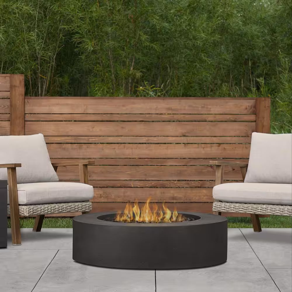 Brookhurst 43 In. W X 13 In. H round Outdoor GFRC Liquid Propane Fire Pit in Carbon with Lava Rocks